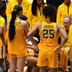 WVU Women's Basketball Gold Jersey Huddle