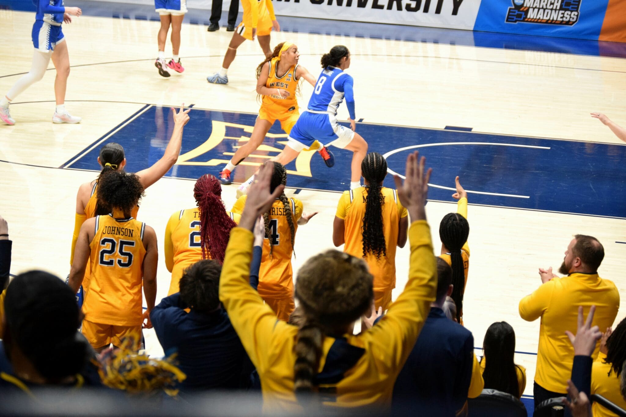 WVU fans at NCAA Tournament game at Hope Coliseum