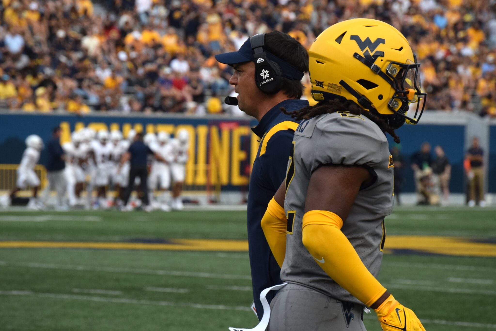 WVU Football HC Neal Brown and Aubrey Burks