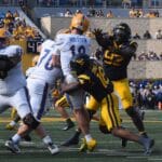 WVU Football Curtis Jones Jr. sacking Pitt quarterback Eli Holstein