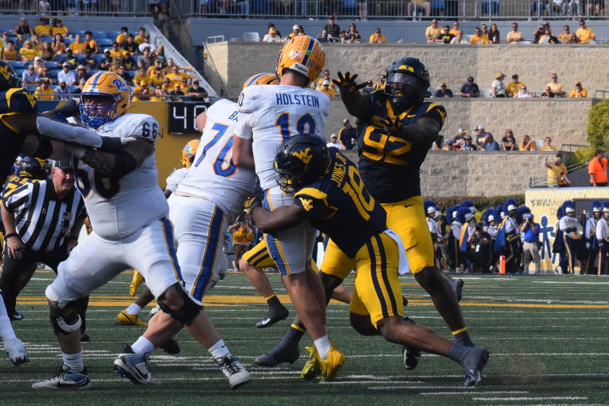 WVU Football Curtis Jones Jr. sacking Pitt quarterback Eli Holstein
