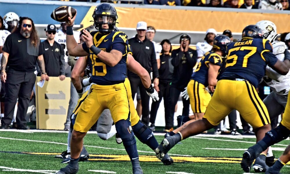 WVU Football QB Scotty Fox throwing against Colorado