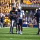 WVU Football HC Neal Brown and QB Garrett Greene at Pitt