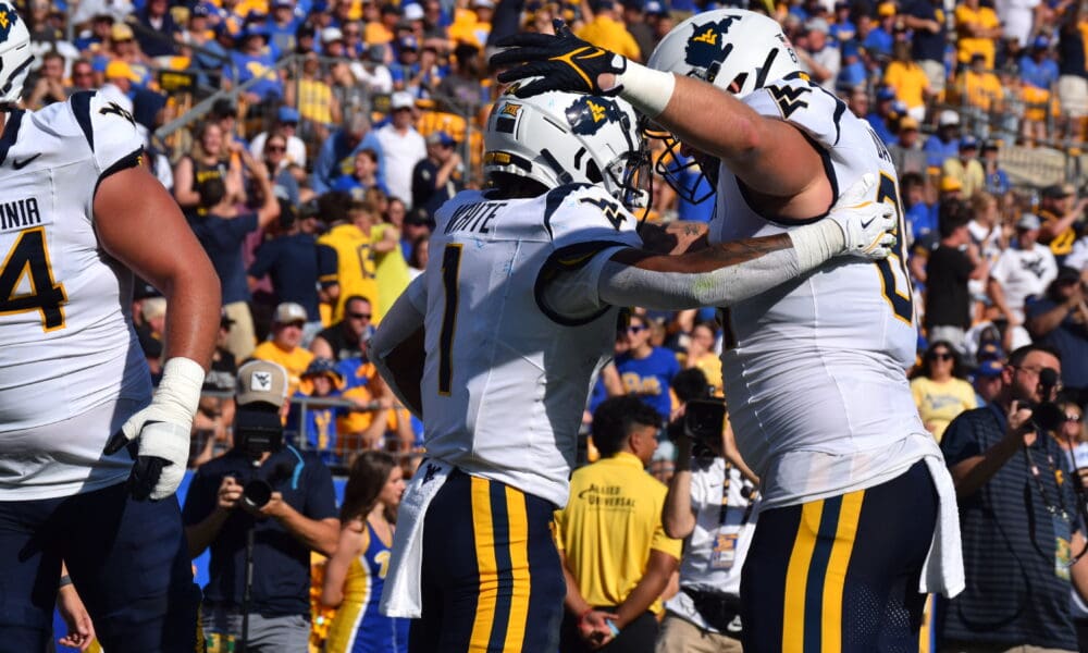 WVU Football RB Jahiem White celebrates TD with Treylan Davis