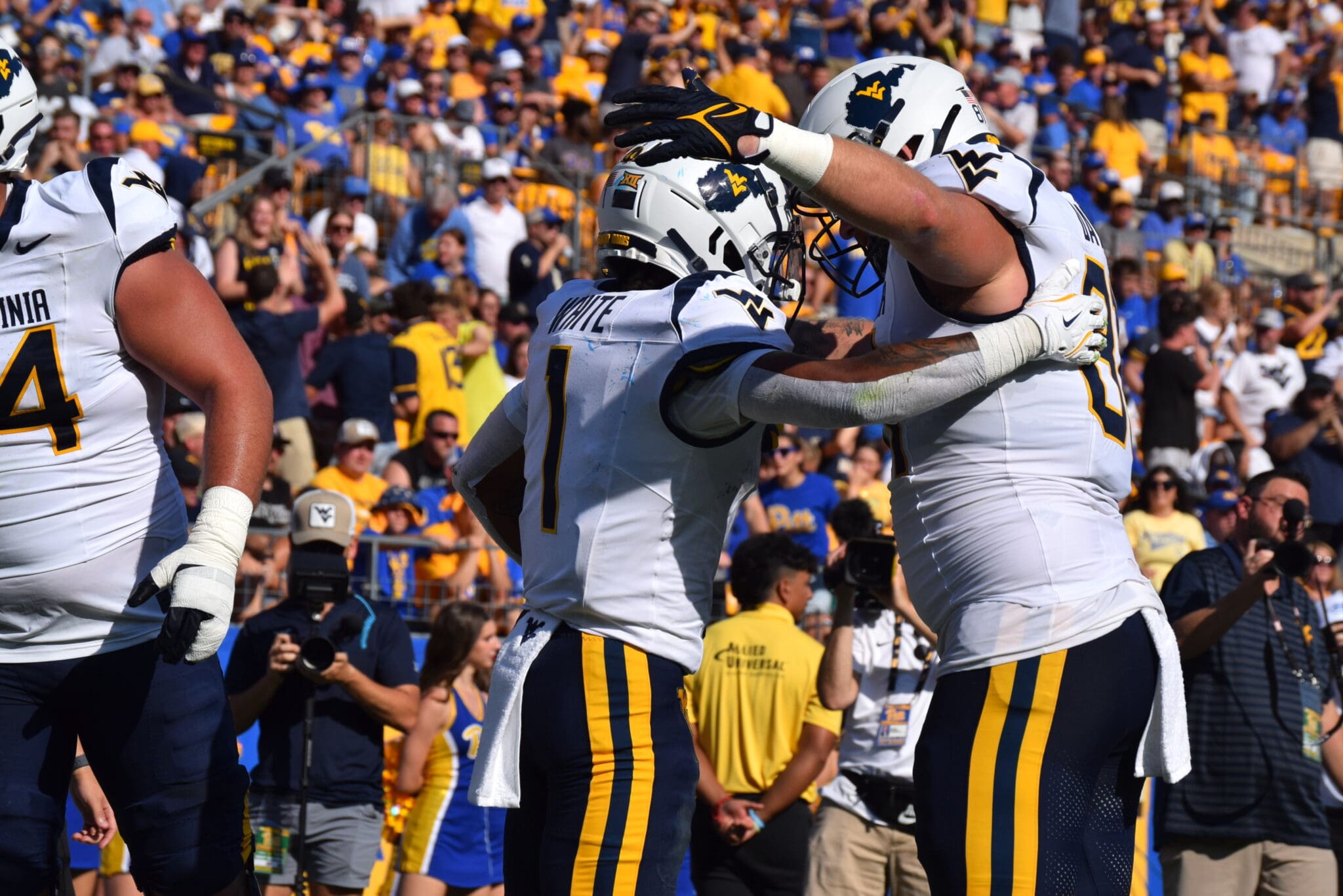 WVU Football RB Jahiem White celebrates TD with Treylan Davis