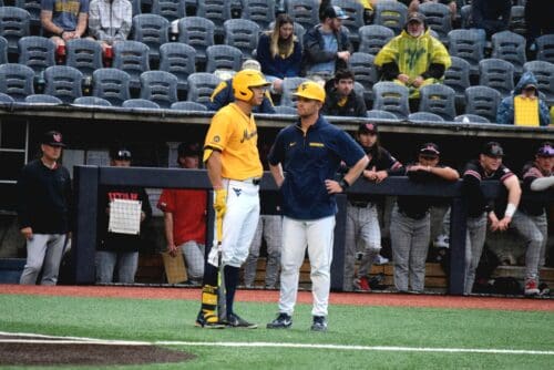 WVU Baseball HC Steve Sabins with player