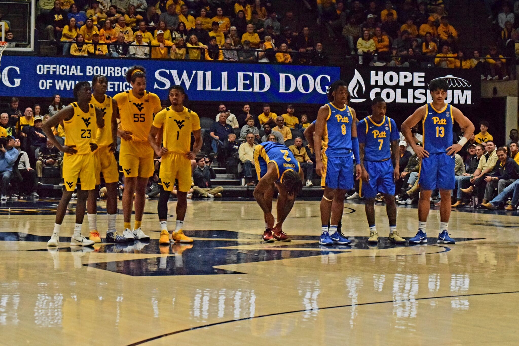 WVU Basketball group of players against Pitt