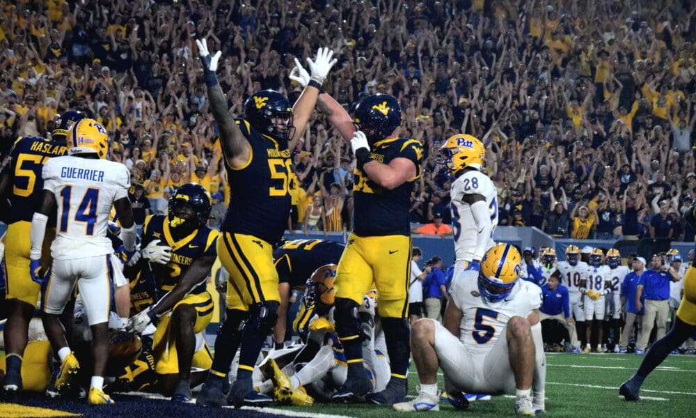 WVU Football celebrates during Backyard Brawl against Pitt