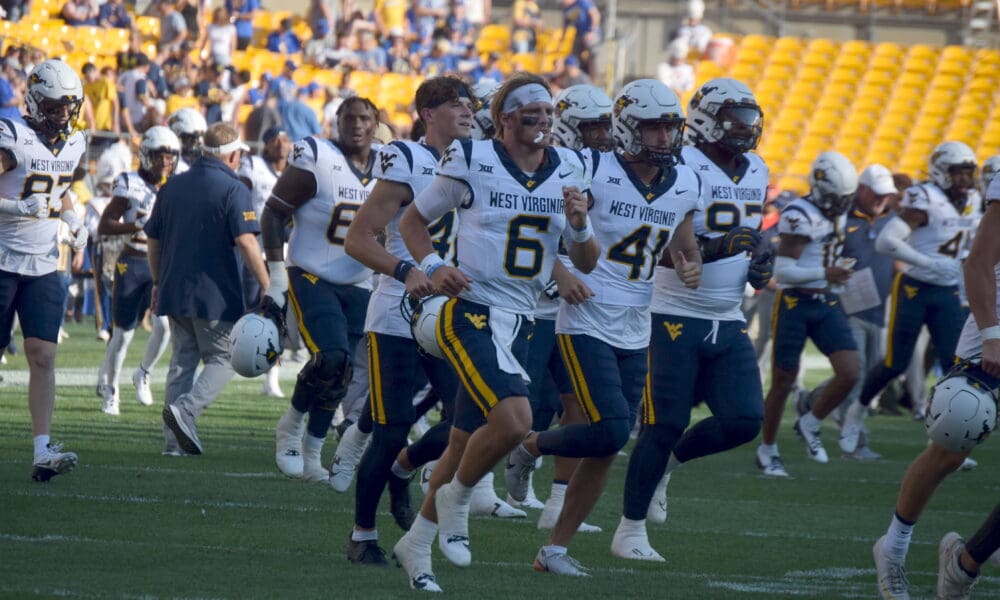 WVU Football team with Garrett Greene