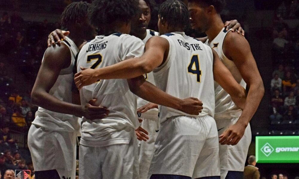 WVU Basketball Team Huddle