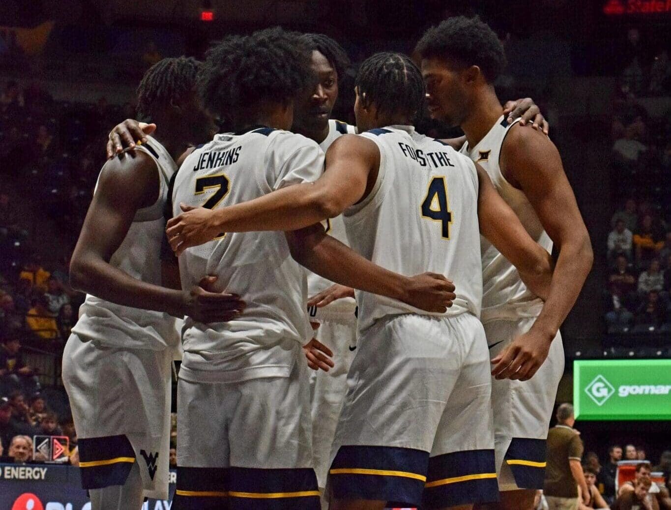 WVU Basketball Team Huddle