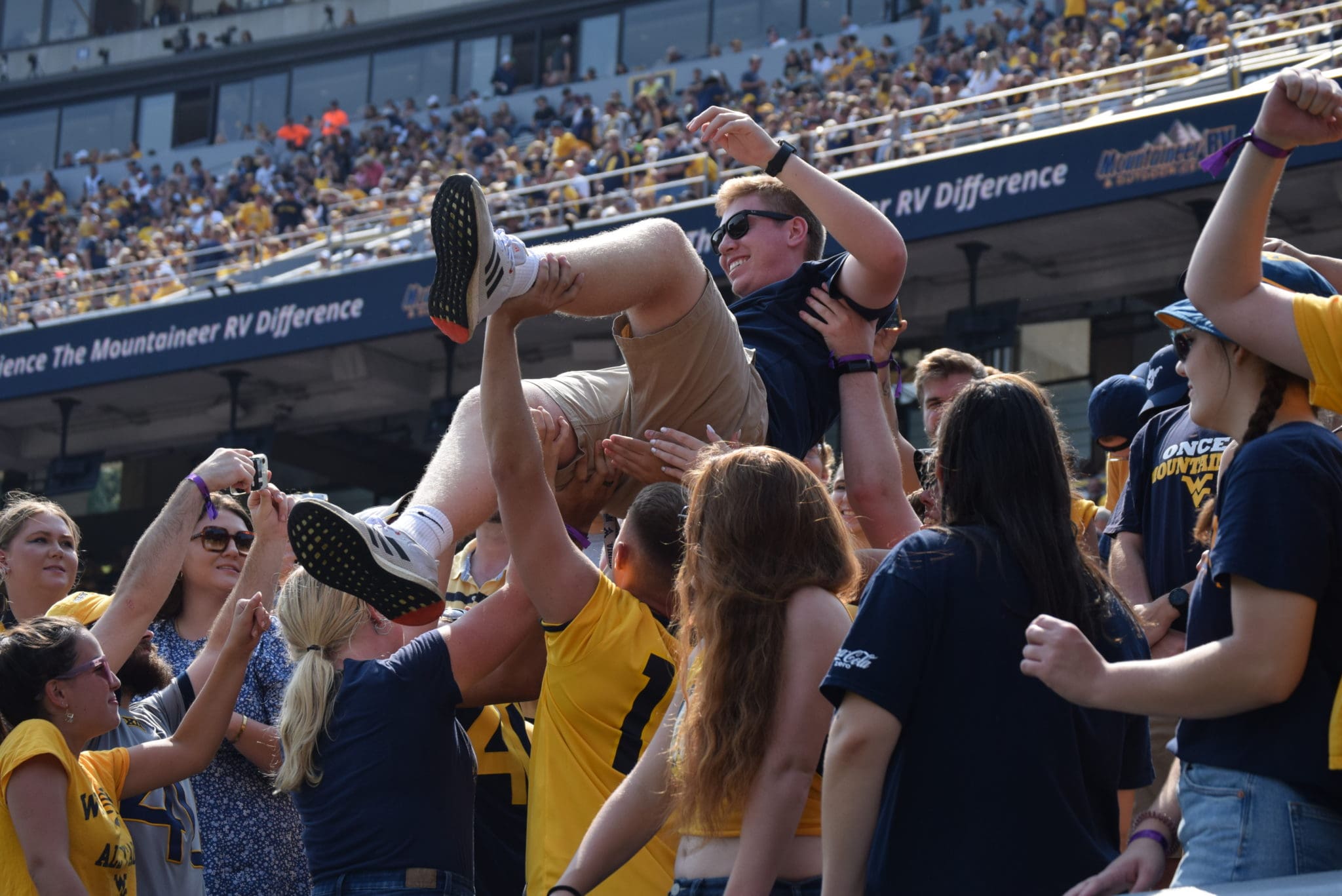 WVU football fans celebrate touchdown