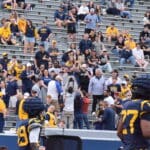 WVU Football Rich Rodriguez in stands with fans during spring showcase