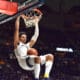WVU Basketball Tre Mitchell dunking
