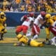 Aubrey Burks and WVU Defense tackling against Texas Tech