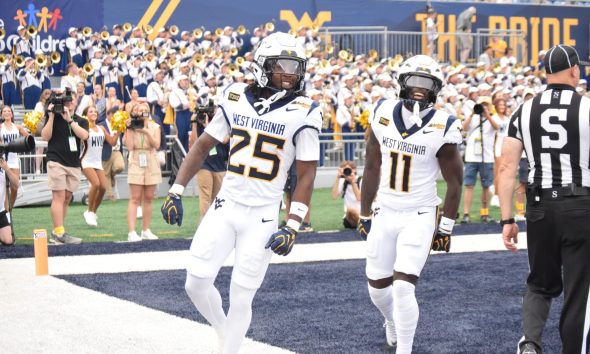 WVU Football WR Armoni Weaver-Bomar and Taron Francis celebrating