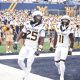 WVU Football WR Armoni Weaver-Bomar and Taron Francis celebrating