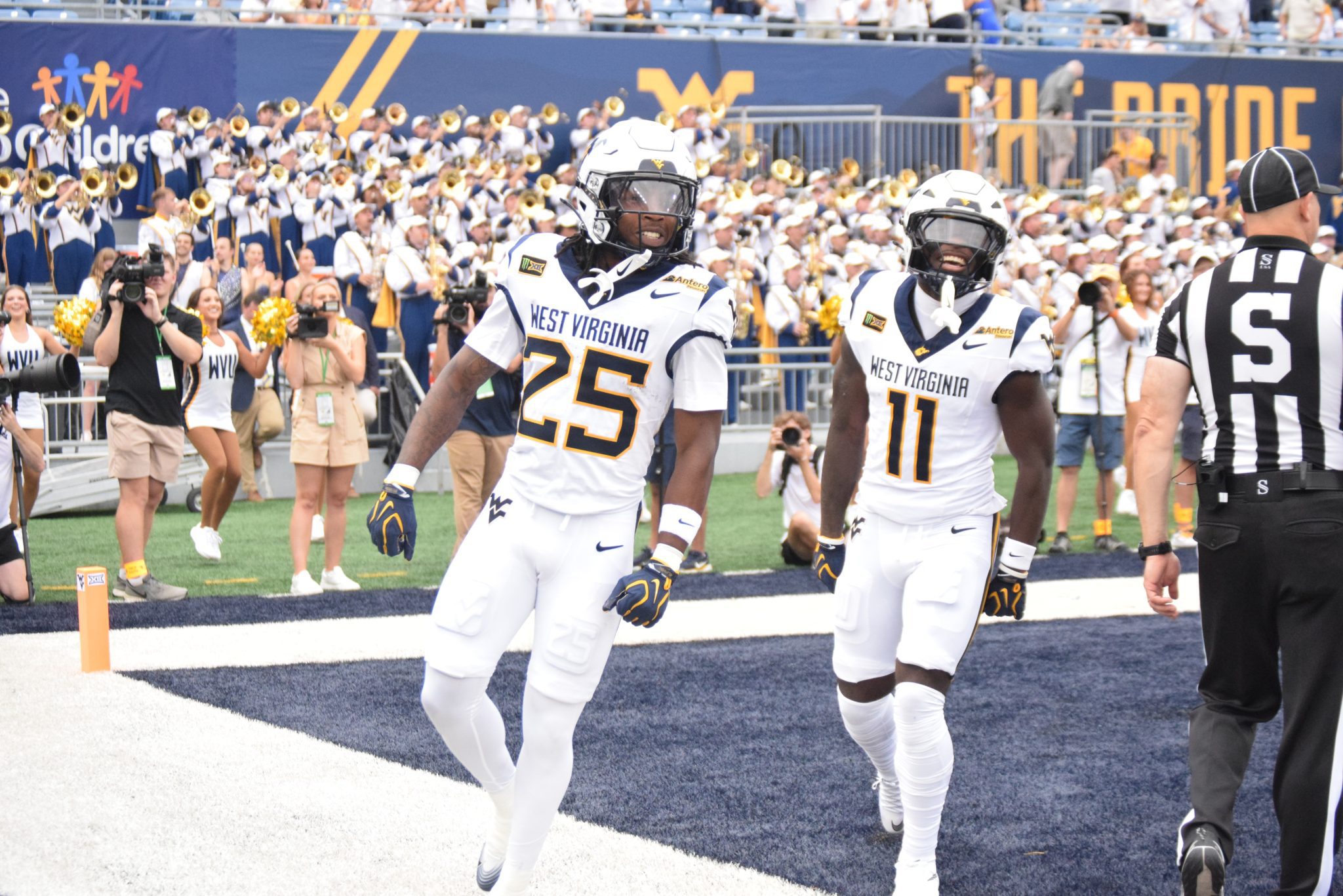 WVU Football WR Armoni Weaver-Bomar and Taron Francis celebrating