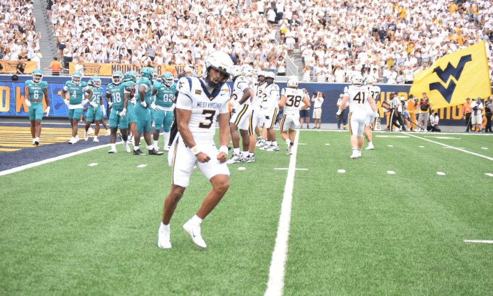 WVU Football QB Michael Hawkins celebrating