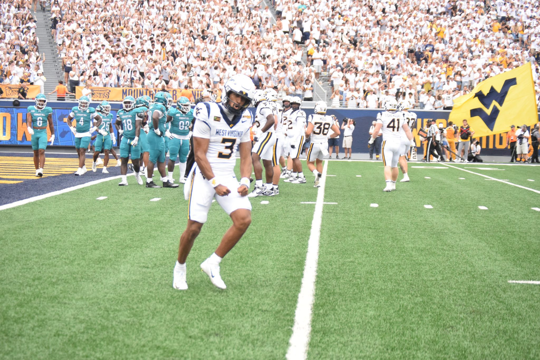 WVU Football QB Michael Hawkins celebrating