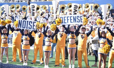 WVU Football Cheerleaders Defense Signs STOCK photo