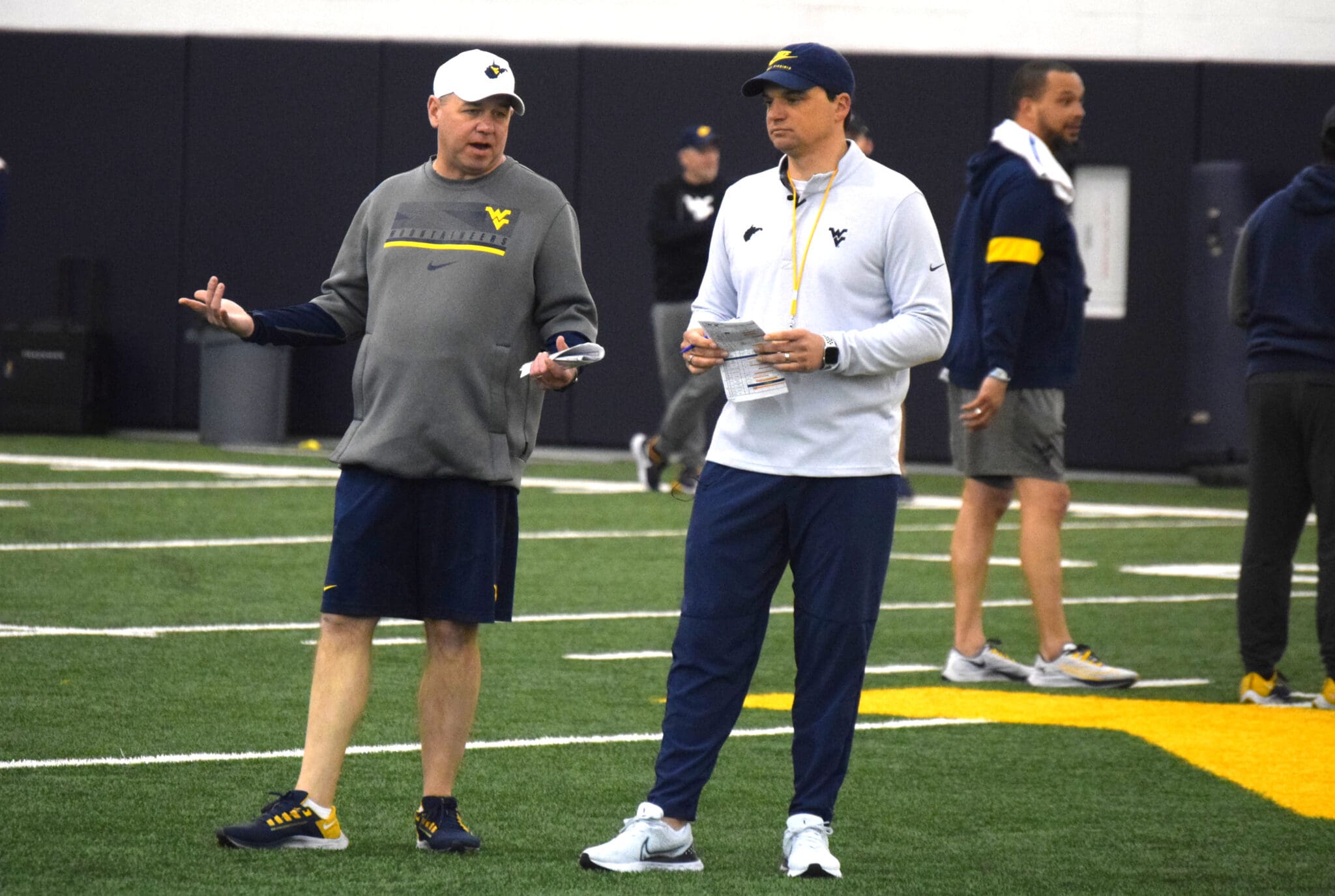 WVU Football HC Neal Brown and Sean Reagan