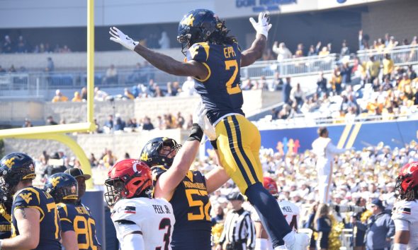 WVU Football WR DJ Epps celebrating a touchdown against Cincinnati