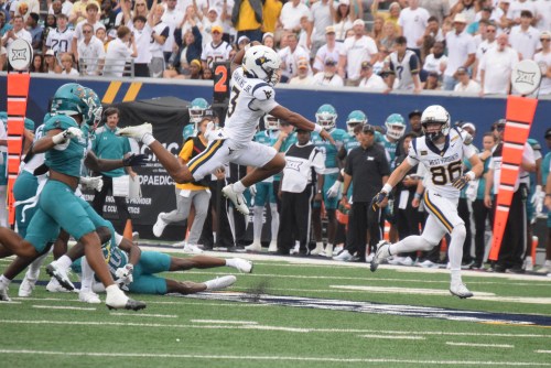 WVU Football QB Michael Hawkins Jr. Goes airborne versus Costal Carolina