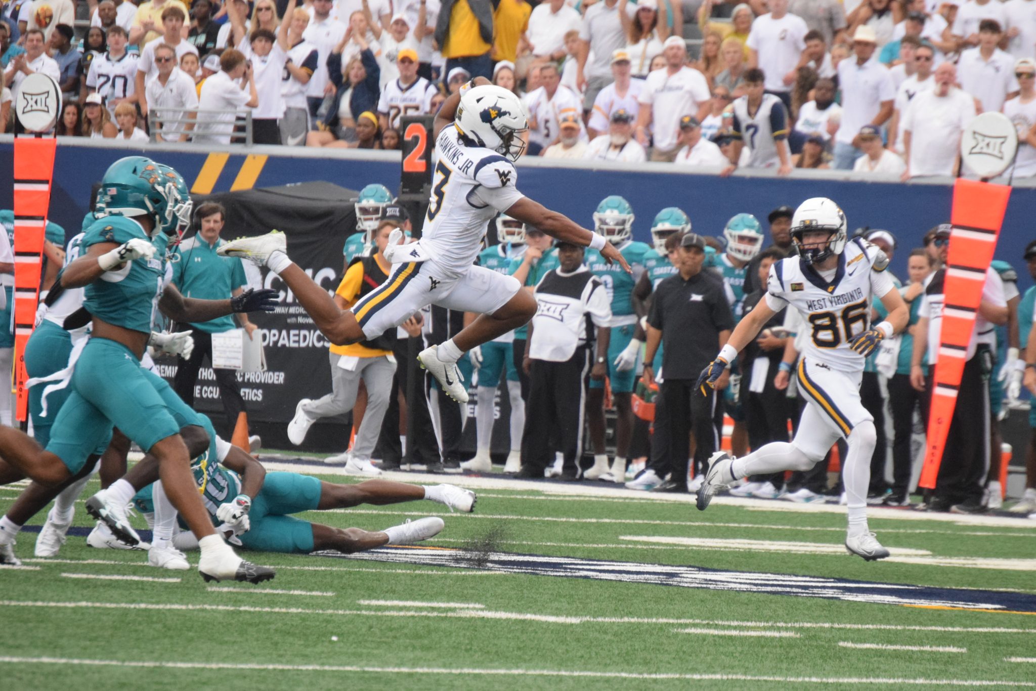 WVU Football QB Michael Hawkins Jr. Goes airborne versus Costal Carolina