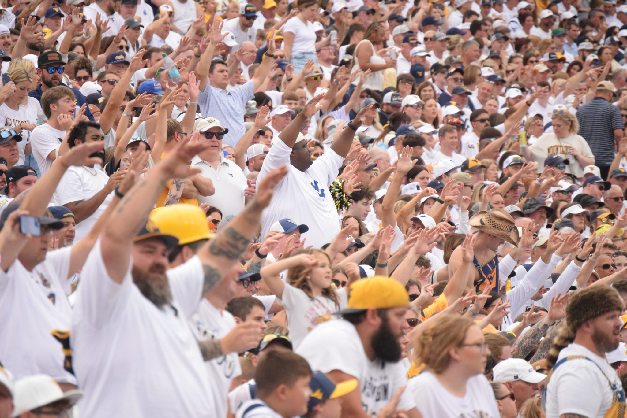 WVU Football Fans in White stock photo
