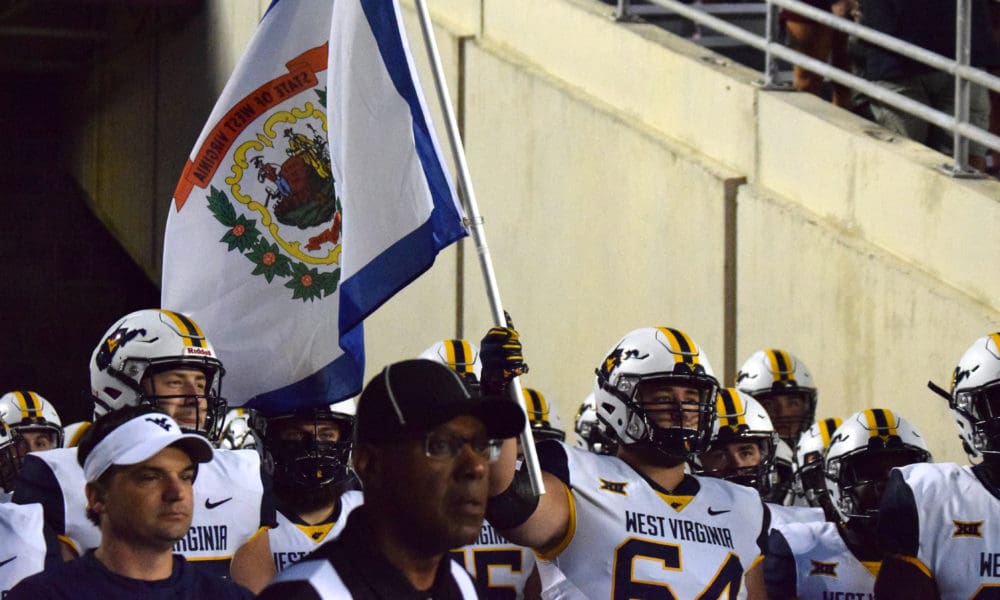 Entrance WV Flag by WVU football OL Wyatt Milum