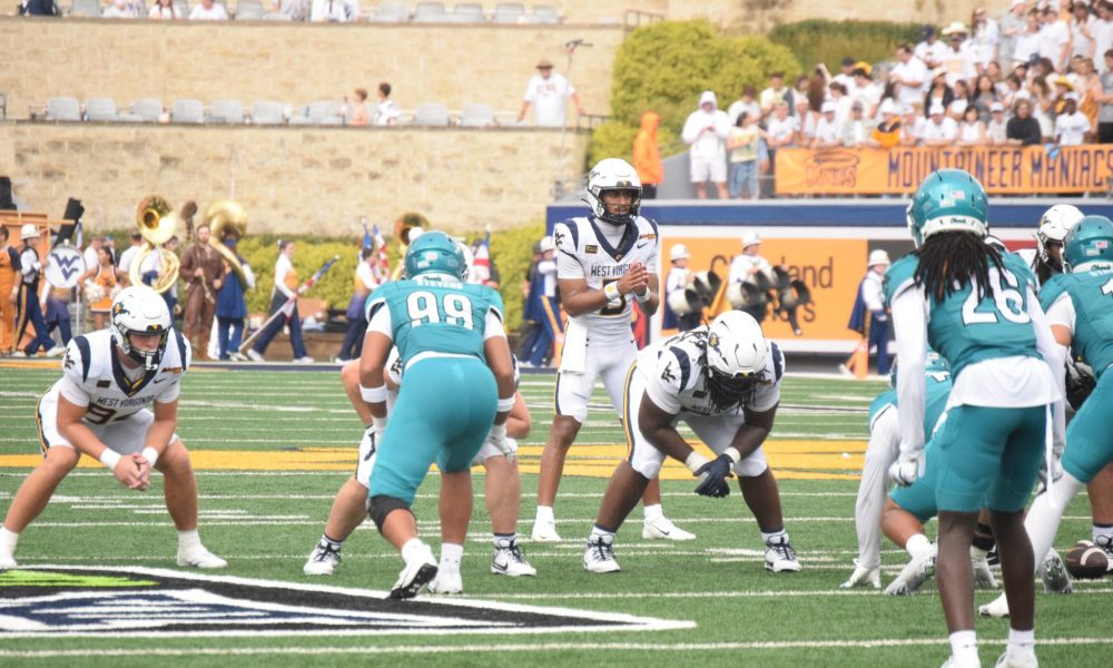 WVU Football QB Michael Hawkins throwing against Coastal Carolina