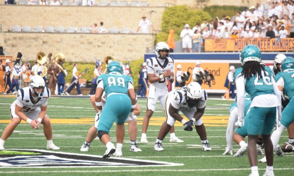 WVU Football QB Michael Hawkins throwing against Coastal Carolina