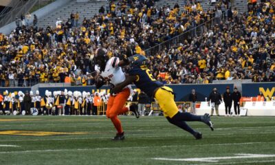 WVU Football DL Tyrin Bradley making tackle against Oklahoma State/