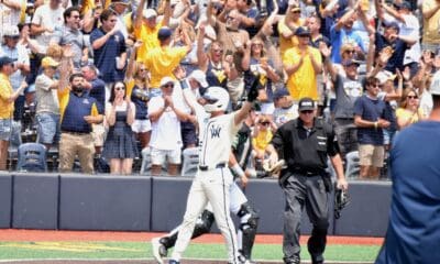 WVU Baseball celebrates after home run during Super Regional