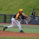 WVU Baseball pitcher Ben Hampton delivers a pitch.