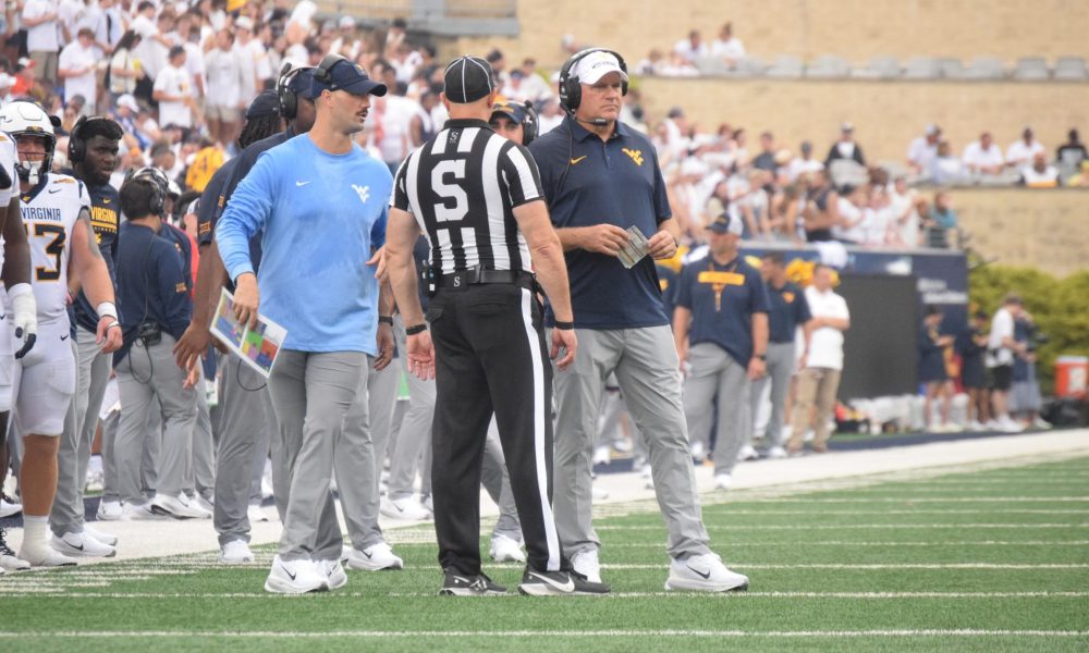 WVU Football HC Rich Rodriguez and DC Zac Alley on sideline