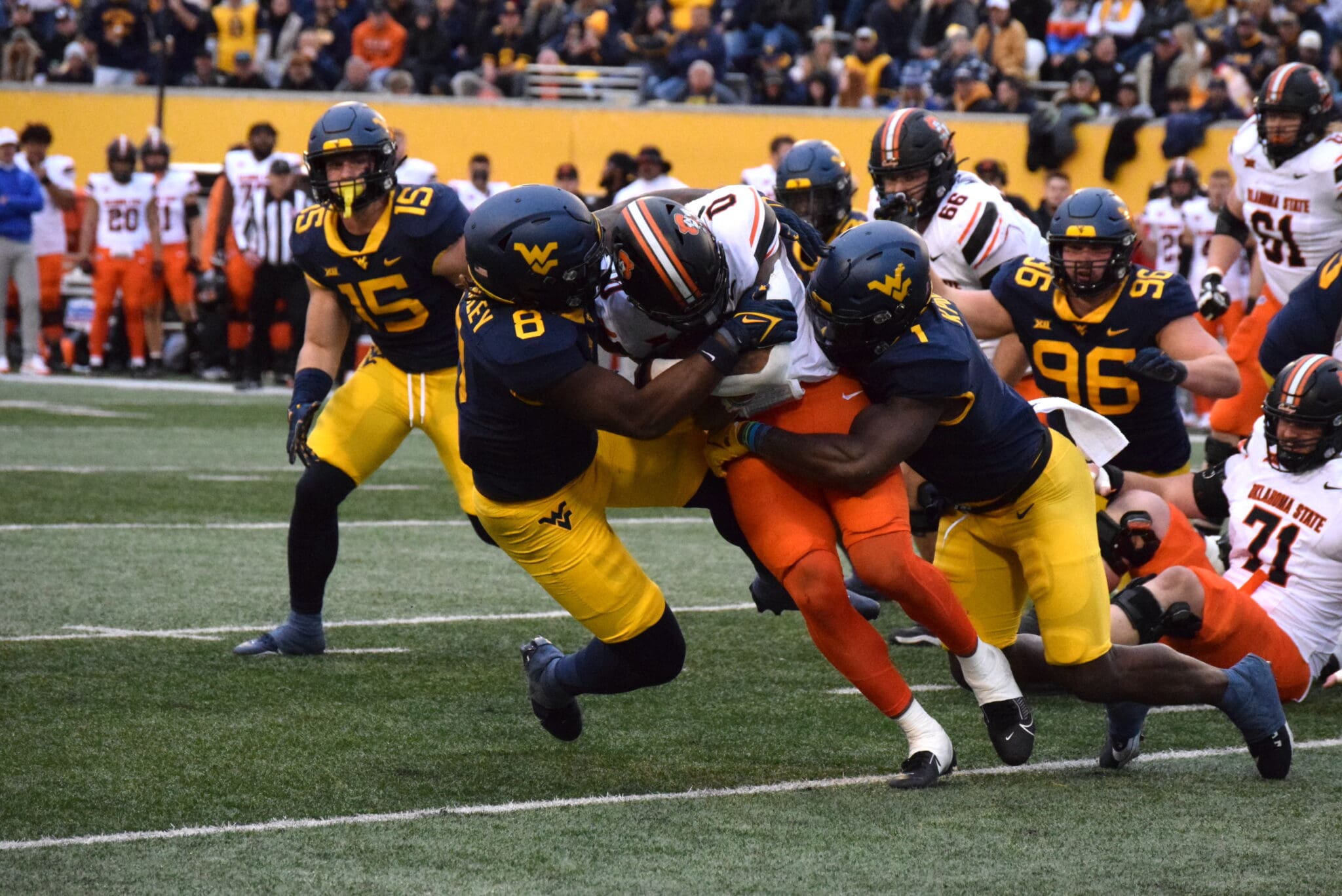 WVU Football Tyrin Bradley and Lee Kpogba tackle Oklahoma State RB Ollie Gordon