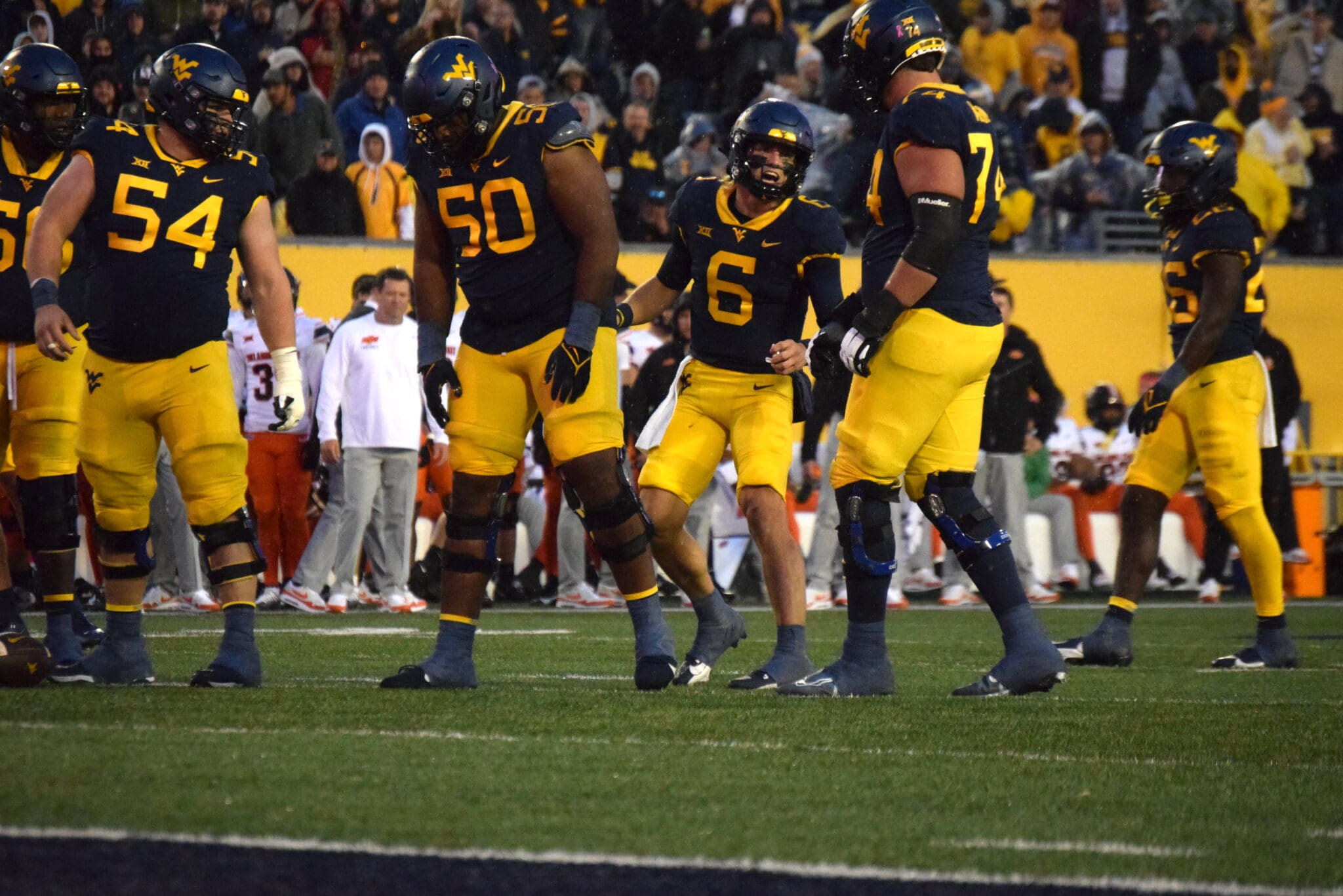 Zach Frazier and WVU Football Offensive Line and QB Garrett Greene