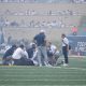WVU Football HC Rich Rodriguez on field during Darius Wiley's injury