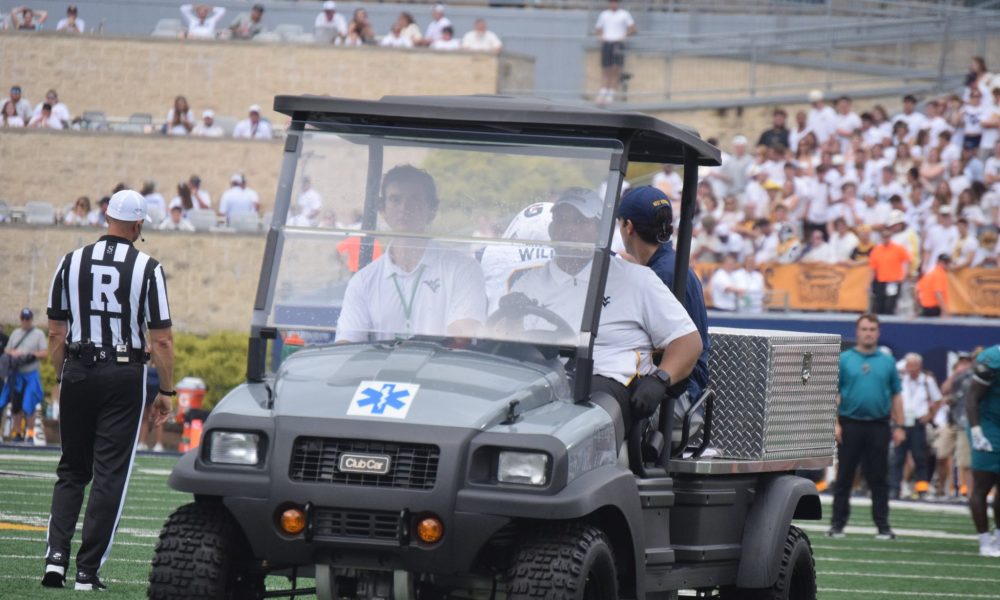 WVU Football DL Darius Wiley carted off