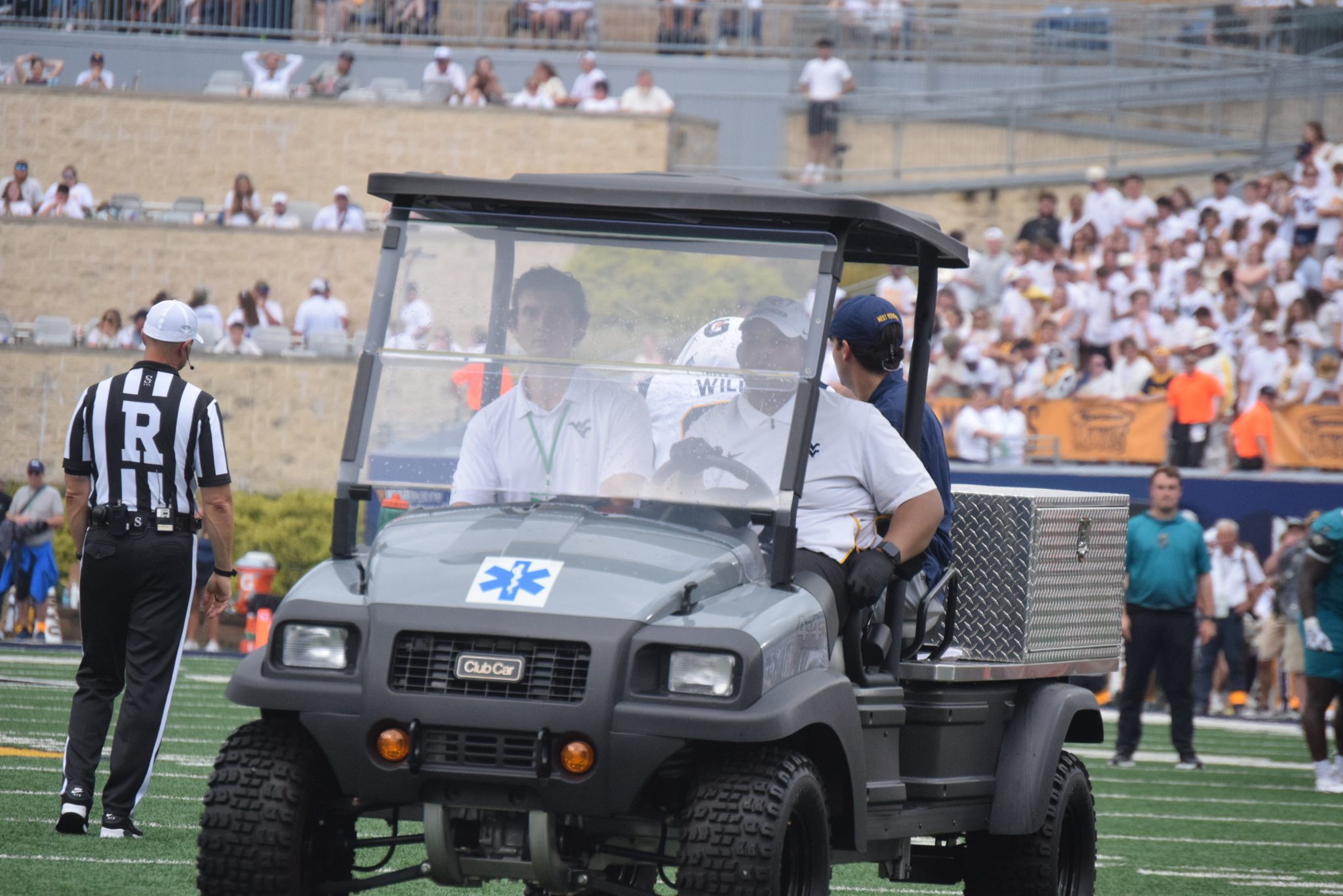 WVU Football DL Darius Wiley carted off