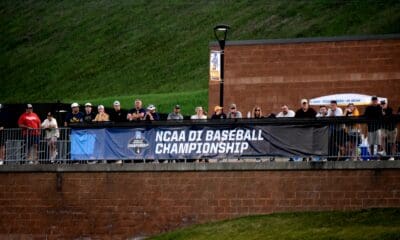 WVU Baseball fans behind NCAA Regional sign