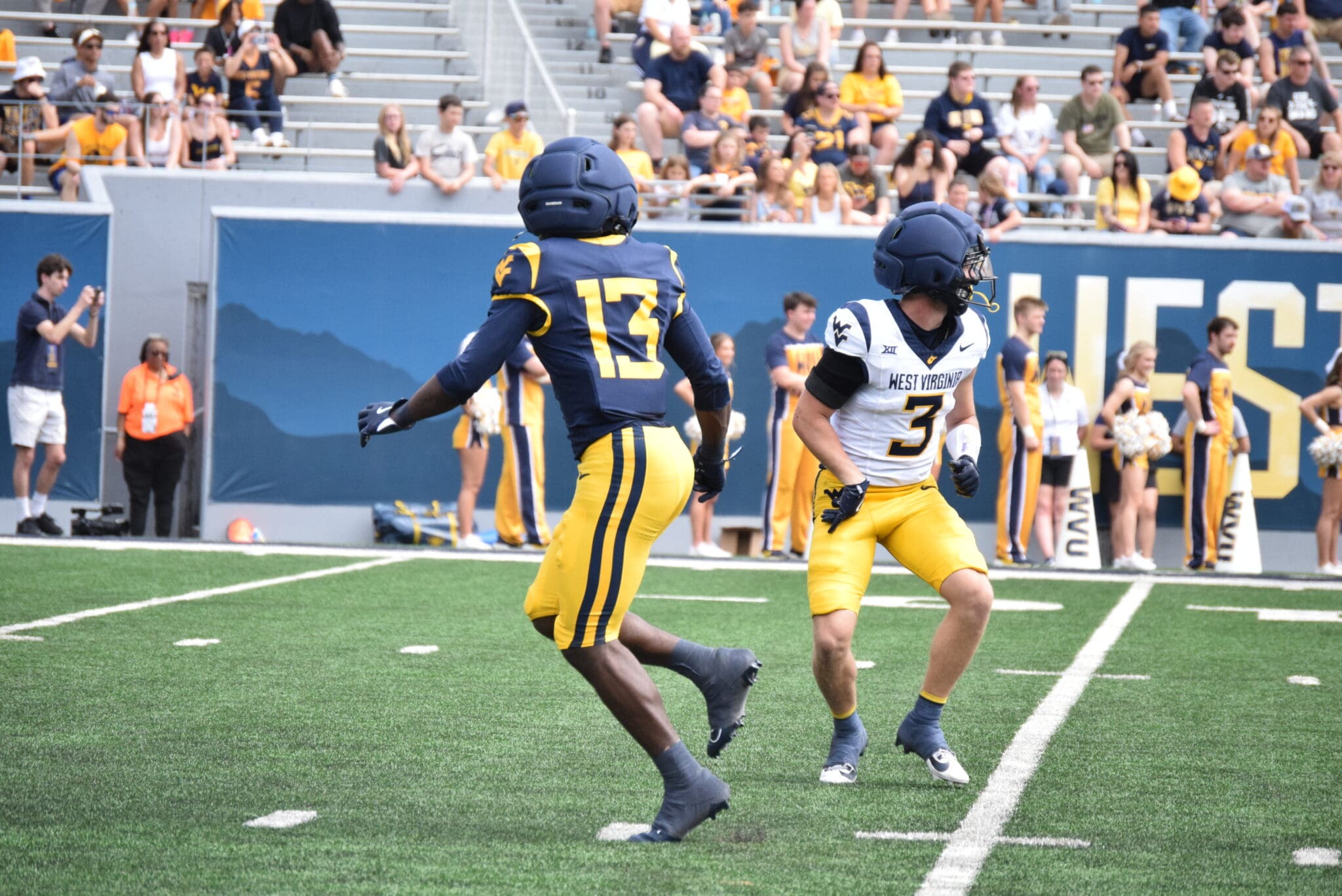 WVU Football WR Kedrick Triplett battling Matt Sieg during scrimmage