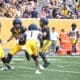 WVU Football DB Geimere Latimer rushing during scrimmage