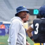 WVU Football legend Pat White with Michael Hawkins Jr.