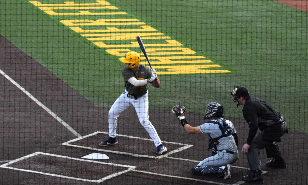 WVU Baseball first baseman Grant Hussey stands in the batter's box.