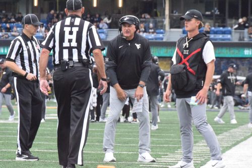 WVU Football Head Coach Rich Rodriguez Talks with Referees