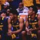 WVU Basketball team on bench