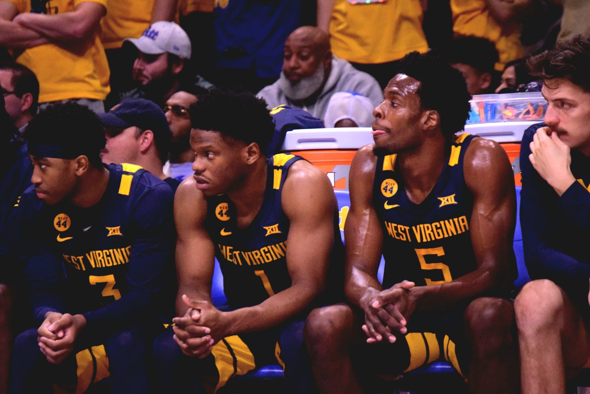 WVU Basketball team on bench